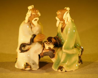unknown Miniature Ceramic Figurine<br>Two Men Sitting at a Table with Fine Detail<br>Color: White & Green