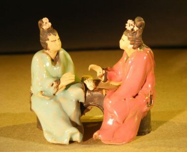 unknown Miniature Ceramic Figurine<br>Two Women Sitting at a Table<br> Color: Red & Green
