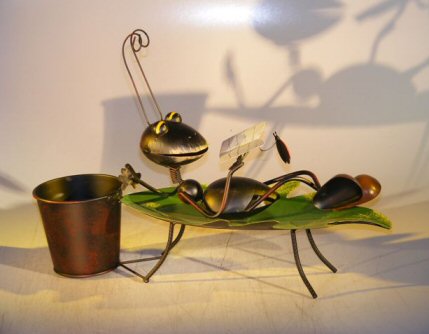 unknown Metal Ant Garden Pot Decoration with Movable Head and Attached Pot Holder<br>17.0 x 5.0 x 12.0 Tall