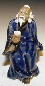 unknown Ceramic Miniature Figurine<br><i></i>Man Holding Drinking Cup<br><i></i>Fine Detail