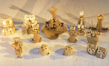 unknown Whimsical Animal Mud Figurines<br>12 Piece Set