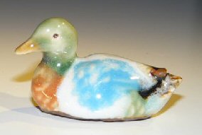 unknown Multi-Colored Miniature Ceramic Duck Figurine<br><i>2.0 x 1.0 x 1.25</i>